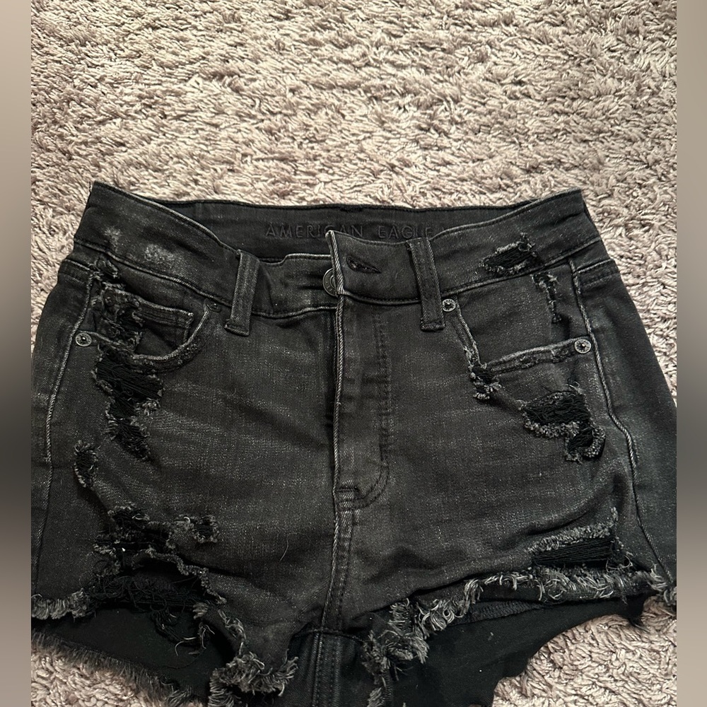 Black jean shorts.
